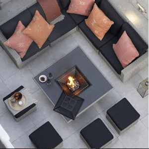 rattan sofa with charcoal fire pit insta image